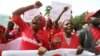 Nigerians take part in a protest demanding for the release of secondary school girls abducted from the remote village of Chibok, in Asokoro district in Abuja, Nigeria, May 13, 2014. 