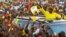 Uganda's President and the presidential candidate Yoweri Museveni of the ruling party National Resistance Movement (NRM) waves to his supporters as he arrives at a campaign rally ahead of the February 18 presidential elections in Entebbe, Uganda Feb. 10, 2016.