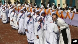 Bangladeshi Catholic nuns arrive to participate in a meeting with Pope Francis at the Church of the Holy Rosary in Dhaka, Bangladesh, Saturday, Dec. 2, 2017. (AP Photo/Aijaz Rahi)