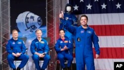 L'astronaute Robert Behnken lors de la présentation des astronautes affectés aux premiers essais en vol et aux premières missions du Boeing CST-100 Starliner et du SpaceX Crew Dragon, le vendredi 3 août 2018, à Houston. (AP Photo/David J. Phillip)