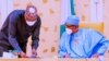 Shugaba Buhari, dama, da sakataren gwamnatin tarayya Boss Mustapha, hagu