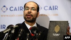 FILE - Council on American-Islamic Relation (CAIR) National Executive Director Nihad Awad answers question during a press conference in Washington, D.C., Sept. 9, 2010.
