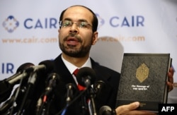 FILE - Nihad Awad, executive director of the Council on American-Islamic Relations, pictured at a Washington news conference in September 2010, says those who think U.S. laws contradict Islamic teachings are misguided.