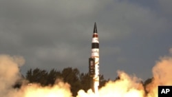 Photograph released by the Indian Ministry of Defense shows India's Agni-V missile, with a range of 5,000 kilometers (3,100 miles), being launched from Wheeler Island off India's east coast, April 19, 2012.
