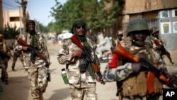 Chadian soldiers patrol the streets of Gao, northern Mali, January 29, 2013.