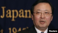 Japanese Coast Guard Commandant Takashi Kitamura speaks during a news conference at the Foreign Correspondents' Club of Japan in Tokyo December 13, 2012.
