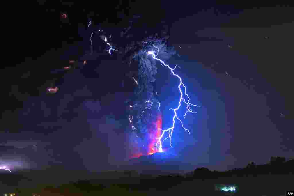 View from Frutillar, southern Chile, of lava spewing from the Calbuco volcano.