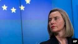 European Union foreign policy chief Federica Mogherini pauses before answering questions during a media conference at the European Council building in Brussels, Monday, Dec. 17, 2018.