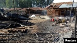 Attackers set fire to an Ebola treatment center run by Medecins Sans Frontieres (MSF) in the east Congolese town of Katwa, Democratic Republic of Congo, Feb. 25, 2019. (Laurie Bonnaud/MSF)
