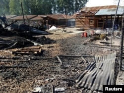 Burned structures are seen after attackers set fire to an Ebola treatment center run by Medecins Sans Frontieres (MSF) in the east Congolese town of Katwa, Democratic Republic of Congo, Feb. 25, 2019. Picture taken February 25, 2019. (Laurie Bonnaud/MSF)