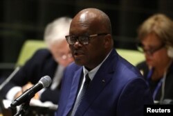 FILE - Burkina Faso's President Roch Marc Christian Kabore addresses the United Nations Summit for Refugees and Migrants, in the Trusteeship Council Chamber of the United Nations, Sept. 19, 2016.