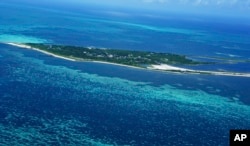 FILE - An aerial view of the outlying Atoll National Park of the Dongsha Islands, 150 miles (236 kilometers) southwest of the southern Taiwanese port of Kaohsiung, Taiwan, Sept. 15, 2010.