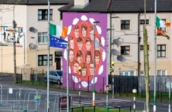 A mural commemorating the victims of the 1972 Bloody Sunday killings, is pictured in the Bogside area of Londonderry, (Derry) in Northern Ireland on Jan. 29, 2022, on the eve of the 50th anniversary of the Bloody Sunday shootings.