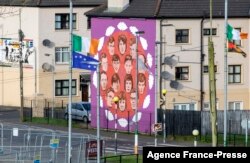 A mural commemorating the victims of the 1972 Bloody Sunday killings, is pictured in the Bogside area of Londonderry, (Derry) in Northern Ireland on Jan. 29, 2022, on the eve of the 50th anniversary of the Bloody Sunday shootings.