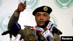 FILE - Interior Ministry spokesman Mansour Turki gestures during a news conference in Riyadh.