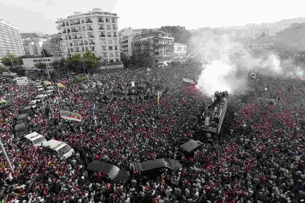 Algerians gather in the the May 1st square in the capital Algiers as they welcome the national team, July 20, 2019, following their victory in the 2019 Africa Cup of Nations (CAN).