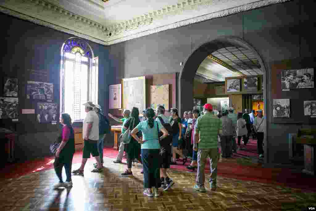 Israeli tourists study Soviet era exhibits in a museum that seems to be a time capsule from half a century ago. (Vera Undritz for VOA)