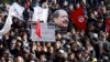 Tunisian Mourners, Police Clash at Opposition Leader Funeral