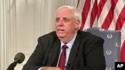 FILE - West Virginia Gov. Jim Justice addresses a news conference, Feb. 27, 2018, at the state Capitol in Charleston.