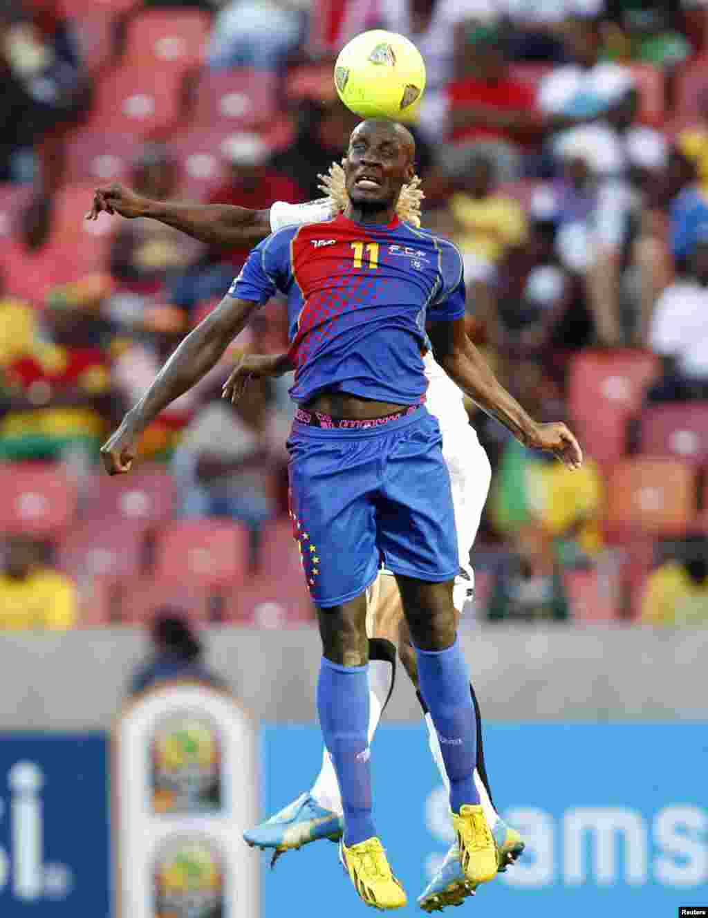 Cape Verde's Julio Tavares (11) vies for a high ball against Ghana's Isaac Vorsah during their African Cup of Nations (AFCON 2013) quarter-final soccer match at the Nelson Mandela Bay Stadium in Port Elizabeth, South Africa.