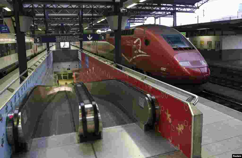 Empty platforms are seen near a Thalys train at Midi/Zuid railway station, during a nationwide strike over the government's planned pension reform and budget cuts, in Brussels, Belgium, Dec. 15, 2014.