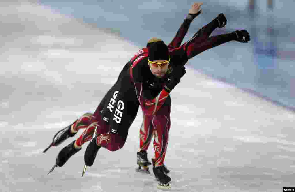 Members of the German speedskating team practice at the Adler Arena on the Olympic Park as preparations continue for the Sochi 2014 Winter Olympics in Russia.