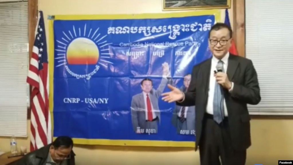 The video screenshot shows former Cambodian opposition leader Sam Rainsy talks about the formation of Cambodia National Rescue Movement (CNRM) at a Cambodian temple in Brooklyn, New York, January 13, 2018. (Courtesy of Sam Rainsy Facebook page)