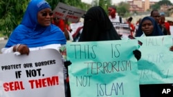 Muslim women attend a demonstration calling on the government to increase efforts to rescue the 276 missing kidnapped school girls of a government secondary school Chibok, in Lagos, Nigeria, May 5, 2014.