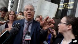 Steven Wise, president of the Nonhuman Rights Project, answers a question outside Manhattan State Supreme Court, in New York, after a hearing, May 27, 2015. Lawyers for two chimpanzees went to court to argue that the animals have "personhood" rights and should be freed from the Long Island university where they are kept. 