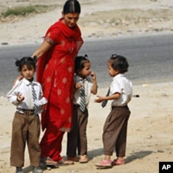 Shreejana Thapa accompanies her daughters after school at Naubise village near Kathmandu (File)