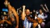 Argentinian fans celebrate after their team defeated the Netherlands in their World Cup semi-final match, at Copacabana Beach in Rio de Janeiro July 9, 2014. 