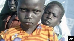 Children in then unified Sudan await food aid in 2009. Officials say Eastern Equatoria needs food aid to avoid disaster. (File)