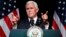 FILE - In this Aug. 9, 2018 photo, Vice President Mike Pence gestures during an event on the creation of a U.S. Space Force at the Pentagon. 