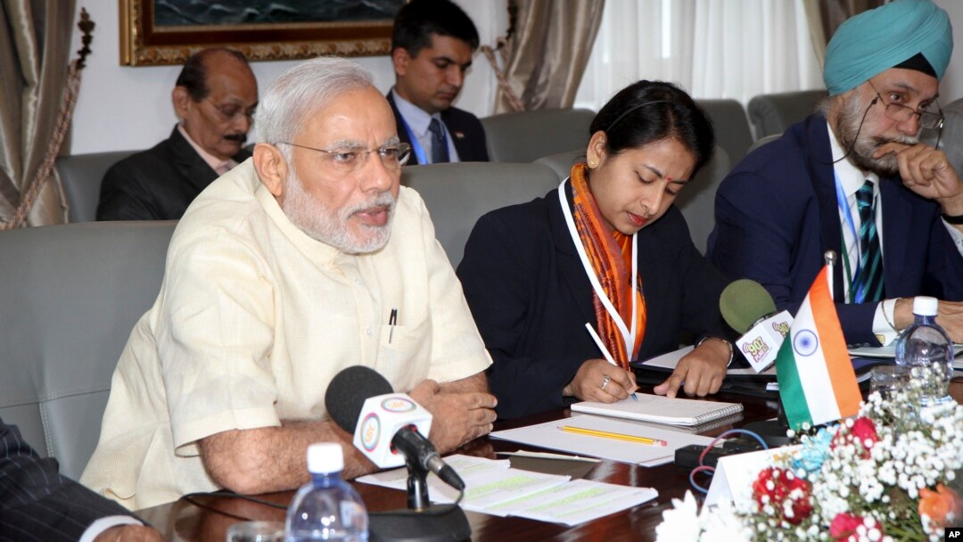 India's Prime Minister Narendra Modi (L) attends a meeting with Seychelles President James Alix Michel in the capital Victoria, Seychelles, March 11, 2015.