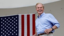 FILE PHOTO: Senator Bill Nelson (D-FL) smiles in West Palm Beach, Florida