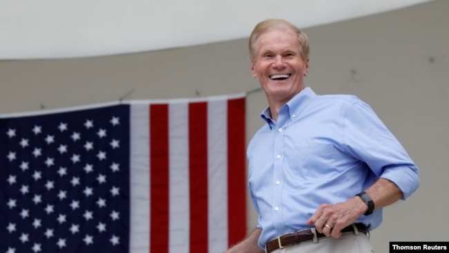 FILE PHOTO: Senator Bill Nelson (D-FL) smiles in West Palm Beach, Florida