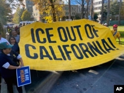 Immigration advocates hold a rally in Sacramento, California, Dec. 2, 2024, to protest President-Elect Donald Trump's plans to conduct mass deportation of immigrants without legal status.