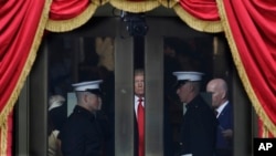 President-elect Donald Trump waits to stop out onto the portico for his presidential inauguration at the U.S. Capitol in Washington, Jan. 20, 2017. 