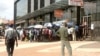 Even an introduction of Zimbabwe’s own currency called “bondnotes” which trade at par with the U.S. dollar, in November last year, has not helped ease an acute shortage of cash which is forcing some people to lots of time in bank queues, Gokwe, Zimbabwe, 