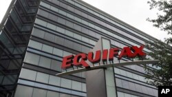 FILE - The Equifax Inc., offices are seen in Atlanta, July 21, 2012. 