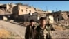 Kurdish Fighters Ready to Take Back Their City