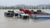 Trucks and vehicles are seen inundated by floodwaters from heavy rains caused by Typhoon Mitag in Gangneung. Six people were killed and several others went missing as Typhoon Mitag lashed the southern and eastern regions of South Korea with heavy rain and strong winds, Yonhap reported.