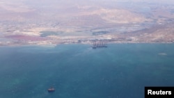 FILE - An aerial view shows the coastline of the Caspian Sea near Baku, Azerbaijan, May 27, 2019. 