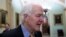 FILE - Senate Majority Whip Sen. John Cornyn, R-Texas, talks with reporters on Capitol Hill, Oct. 11, 2018 in Washington. 