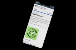 An illustration picture shows the new COVIDSafe app by the Australian government on a mobile phone, as the country works to curb the spread of the coronavirus disease (COVID-19), April 28, 2020.