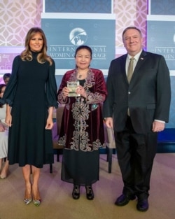 U.S. first lady Melania Trump, Sairagul Sauytbay and Secretary of State Mike Pompeo are pictured at the State Department, March 4, 2020. (State Department photo)