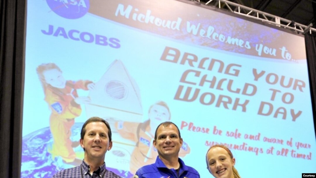 From L to R: Kelley Easley, NASA astronaut Tony Antonelli, and Erin Easley on 'Take Your Child to Work' day at the Michoud Assembly Facility on June 7, 2012.