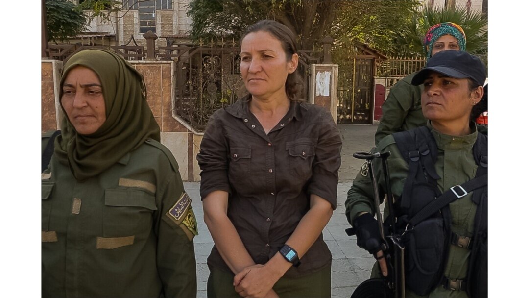 Haval Heline, 34, says her troops will never give up, despite recent losses. "We will fight for it until our last drop of blood," she says. (Yan Boechat/VOA)