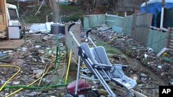 Officials say living conditions in the Casilino 900 camp in Rome are disgraceful and residents must be moved