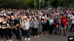 People in Belgrade, Serbia, attend a protest on May 14, 2020, after the arrest of Serbian Orthodox Church priests in Montenegro.